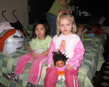 Baby 1 likes to be like Mommy and nurse her doll, Baby 2 likes to too, but she stopped before I could get the picture taken